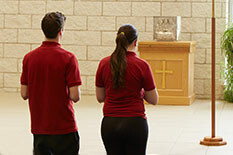 Picture of two people in a church